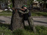 Model soldiers! Weapon-wielding mannequins are spotted in north Kharkiv