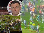 Sheffield United striker Billy Sharp is attacked by a pitch invader at Nottingham Forest