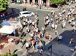 Football thugs hurl chairs at each other in ugly scenes before Europa League final tonight