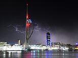 A flashy display: Violent thunderstorms signal a dramatic end to the mini-heatwave
