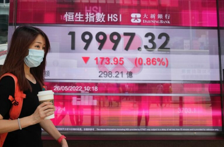 World stocks lower after Fed confirms rate hike plans