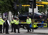 Police carry out a controlled explosion in Trafalgar Square after evacuating public