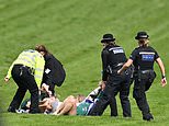 Six Animal Rebellion protestors arrested as they burst through barriers and storm Epsom Derby track