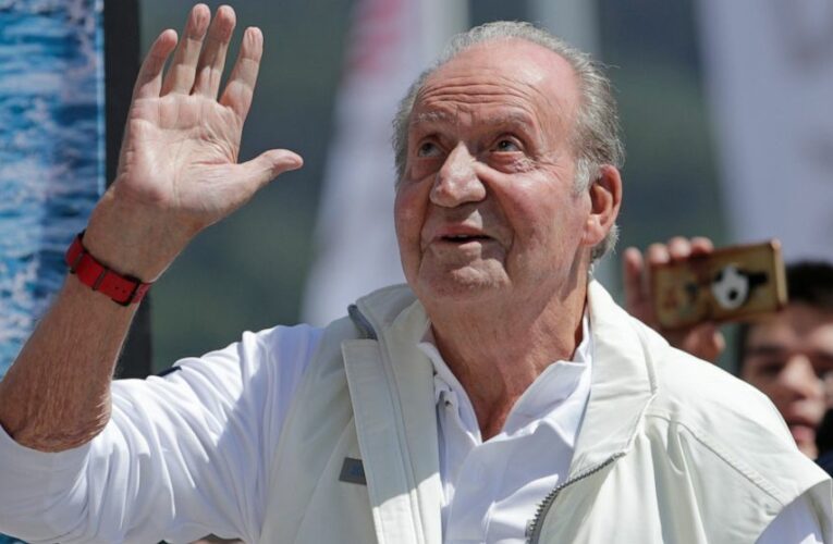 Spain’s scandal-hit former king postpones second trip home