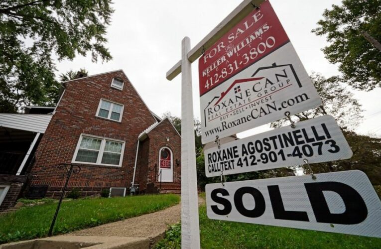 Average long-term US mortgage rates edge down, still over 5%
